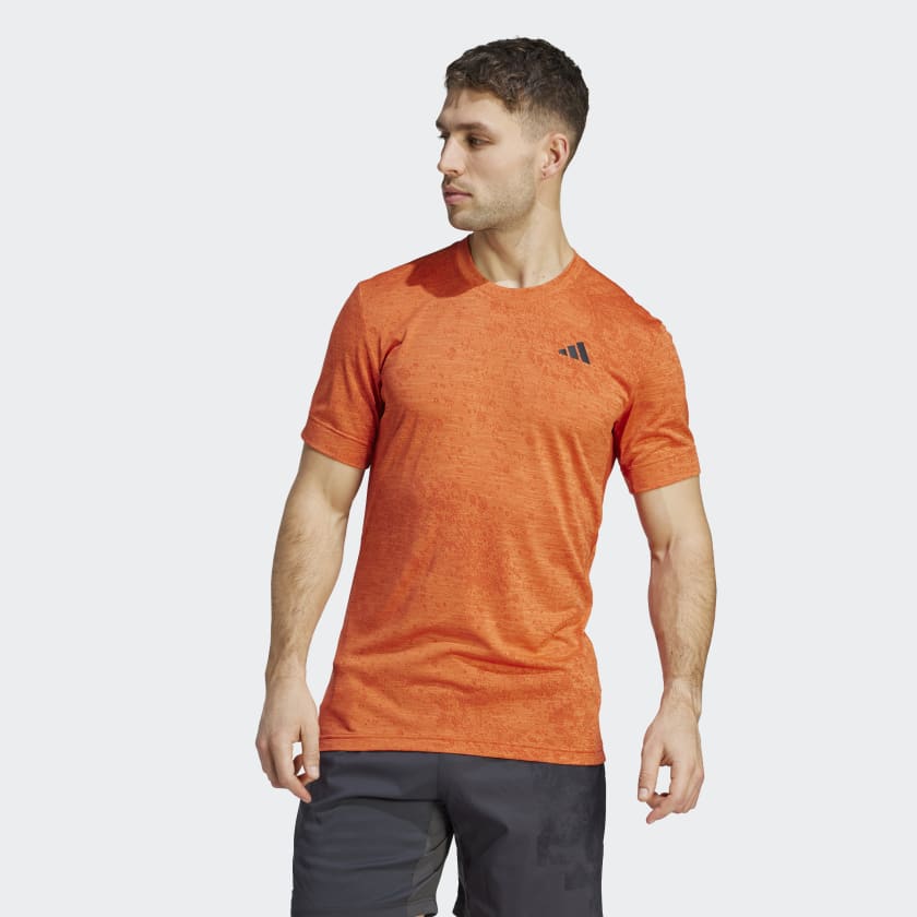ADIDAS TENNIS FREELIFT HERREN T-SHIRT - ORANGE